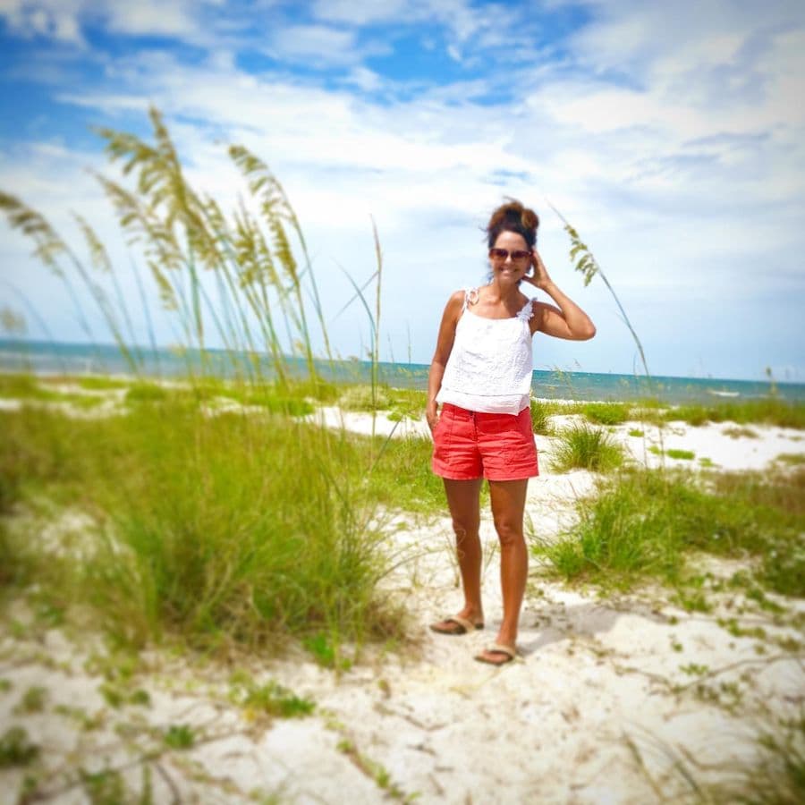Jennifer on the beach among the sea oats