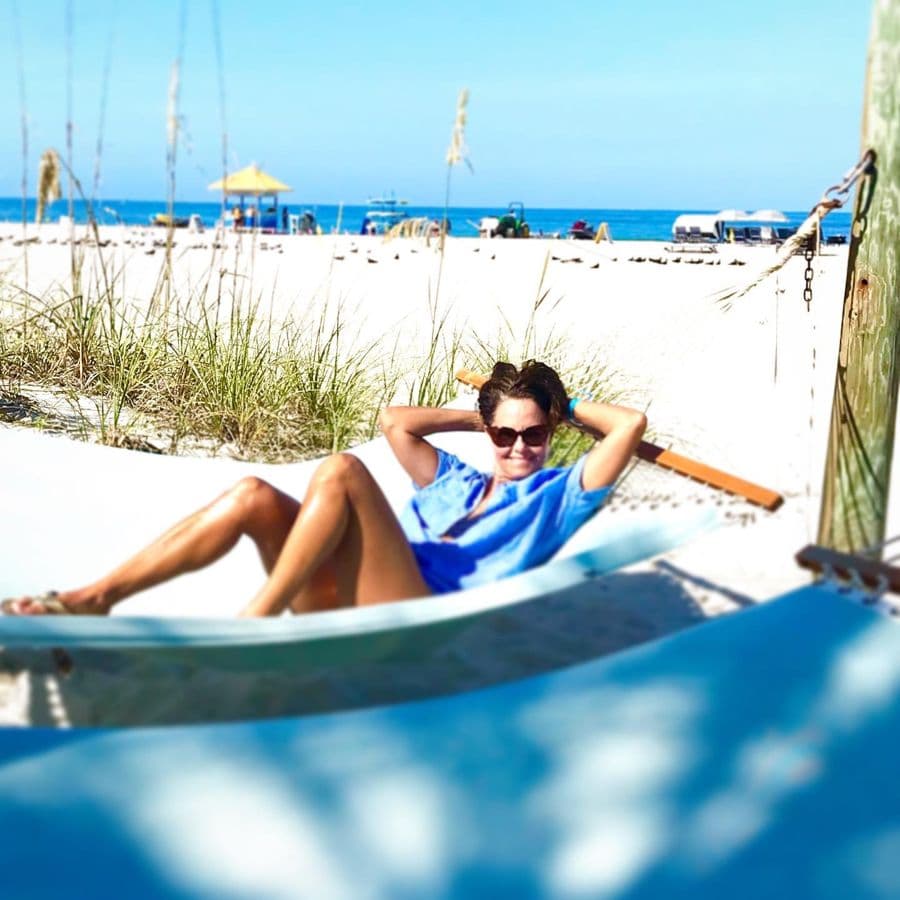 Jennifer in a hammock at the beach